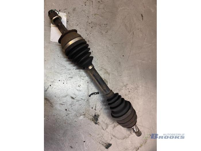 Front drive shaft, left from a Opel Corsa B (73/78/79) 1.7D 1998