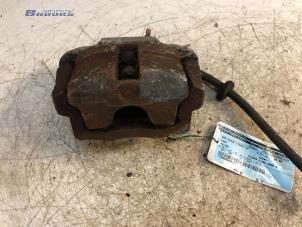 Used Front brake calliper, left Lada Kalina Stationwagon (1117) 1.6 Price € 25,00 Margin scheme offered by Autobedrijf Brooks