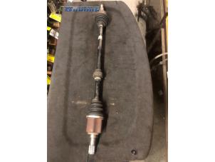 Used Front drive shaft, right Nissan Micra (K12) 1.2 16V Price € 30,00 Margin scheme offered by Autobedrijf Brooks