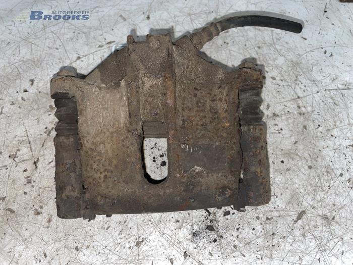 Front brake calliper, left from a Peugeot Partner 1.6 HDI 75 2007