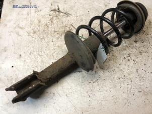 Used Front shock absorber rod, left Renault Clio (B/C57/357/557/577) 1.2 Eco Kat. Price € 20,00 Margin scheme offered by Autobedrijf Brooks