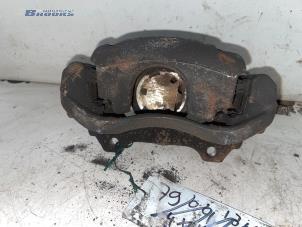 Used Front brake calliper, left Fiat Doblo Cargo (223) 1.3 D 16V Multijet DPF Price € 25,00 Margin scheme offered by Autobedrijf Brooks