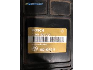 Engine management computer from a Volkswagen Golf III (1H1) 1.8 CL,GL 1993