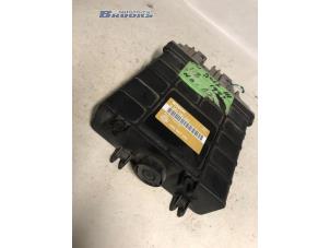 Engine management computer from a Volkswagen Golf III (1H1) 1.8 CL,GL 1993