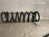 Rear coil spring from a Nissan Terrano II (R20/TR50) 2.4 12V 1997