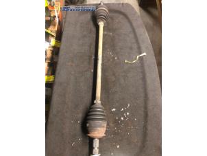 Used Front drive shaft, right Opel Corsa B (73/78/79) 1.4i Price € 20,00 Margin scheme offered by Autobedrijf Brooks