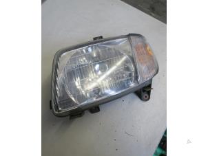 Used Headlight, left Daihatsu Cuore (L251/271/276) 1.0 12V Price € 20,00 Margin scheme offered by Autobedrijf Brooks