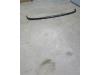 Rear bumper strip, central from a Volkswagen Polo 2001