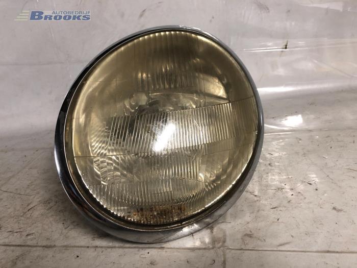 Headlight, left from a Lancia Lybra SW 1.8 16V VVT 2000
