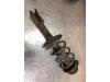 Front shock absorber rod, left from a Renault Clio (B/C57/357/557/577), 1990 / 1998 1.2i RL,RN,RT Kat., Hatchback, Petrol, 1.171cc, 40kW (54pk), FWD, E7F700; E7F750, 1990-04 / 1994-03, B; C; S57A 1992