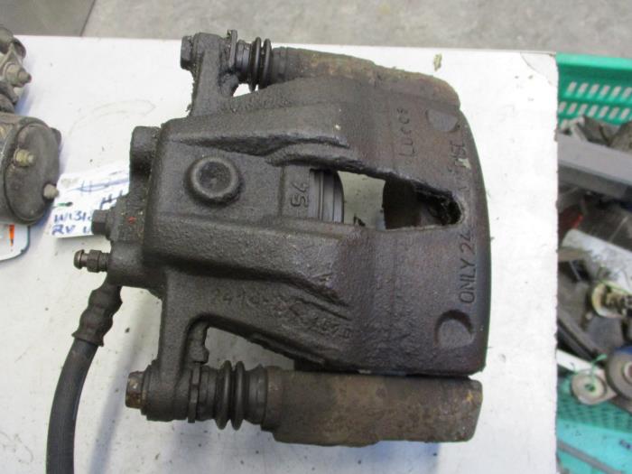 Front brake calliper, right from a Opel Combo (Corsa C) 1.7 DTI 16V 2003