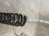 Rear coil spring from a BMW 1 serie (E87/87N) 118i 16V 2005