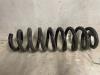 Rear coil spring from a BMW 1 serie (E87/87N) 118i 16V 2005