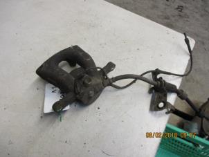 Used Front brake calliper, left BMW 1 serie (E87/87N) 118i 16V Price € 24,00 Margin scheme offered by Autobedrijf Brooks