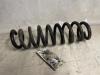 Rear coil spring from a BMW 1 serie (E87/87N) 118d 16V 2007