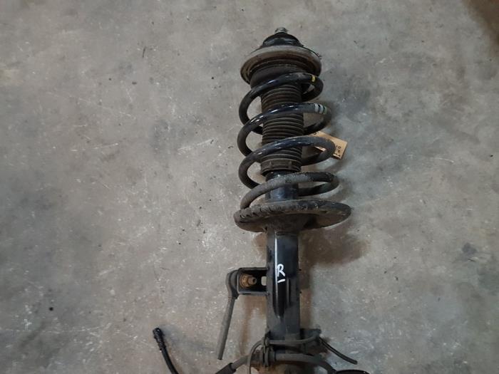 Front shock absorber rod, right from a Volkswagen Transporter T5 2.0 TDI DRF 2012