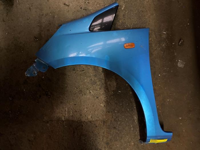 Front wing, left from a Honda Jazz (GE) 1.4 i-Dsi 2011