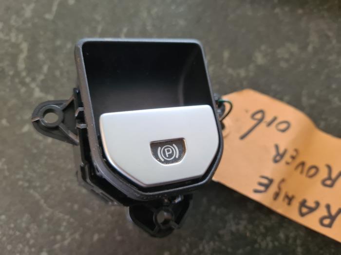 Używane Przelacznik hamulca postojowego Landrover Range Rover Evoque (LVJ/LVS) Cena € 52,50 Procedura marży oferowane przez van de Bunte Teuge B.V.
