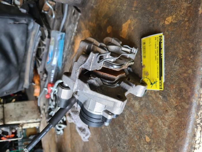 Rear brake calliper, left from a Volkswagen T-Roc 1.5 TSI Evo BMT 16V 2021