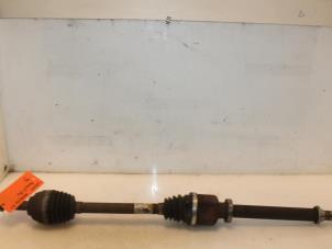 Used Front drive shaft, right Renault Clio III (BR/CR) 1.4 16V Price € 74,99 Margin scheme offered by Van Gils Automotive