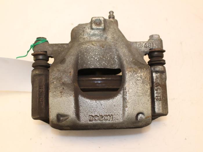 Front brake calliper, left from a Peugeot 107 1.0 12V 2013