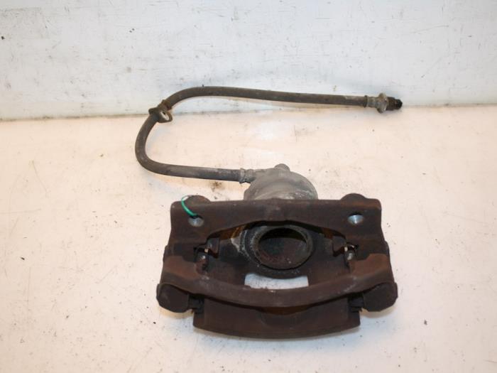Front brake calliper, left from a Peugeot 107  2010