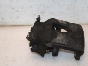 Used Front brake calliper, left Volkswagen Caddy IV 1.6 TDI 16V Price € 60,50 Inclusive VAT offered by Van Gils Automotive