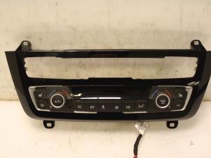 Used Heater control panel BMW 3 serie (F30) 330e Price € 204,49 Inclusive VAT offered by Van Gils Automotive