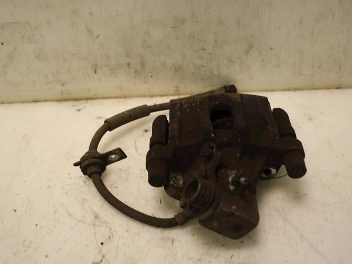 Rear brake calliper, right from a Ford Focus 3 Wagon 1.6 TDCi ECOnetic 2013
