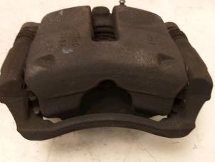 Used Front brake calliper, left Ford B-Max (JK8) 1.6 TDCi 95 Price € 65,00 Margin scheme offered by Van Gils Automotive