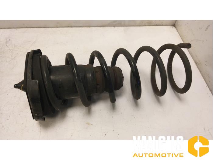 Rear coil spring from a Volvo V60 I (FW/GW) 2.0 D3 16V 2015