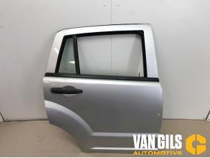 Używane Drzwi prawe tylne wersja 4-drzwiowa Dodge Caliber Cena € 224,00 Procedura marży oferowane przez Van Gils Automotive