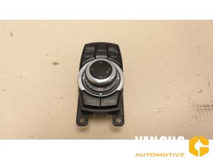 Used I-Drive knob BMW 1 serie (F20) 118i 1.5 TwinPower 12V Price € 110,00 Margin scheme offered by Van Gils Automotive