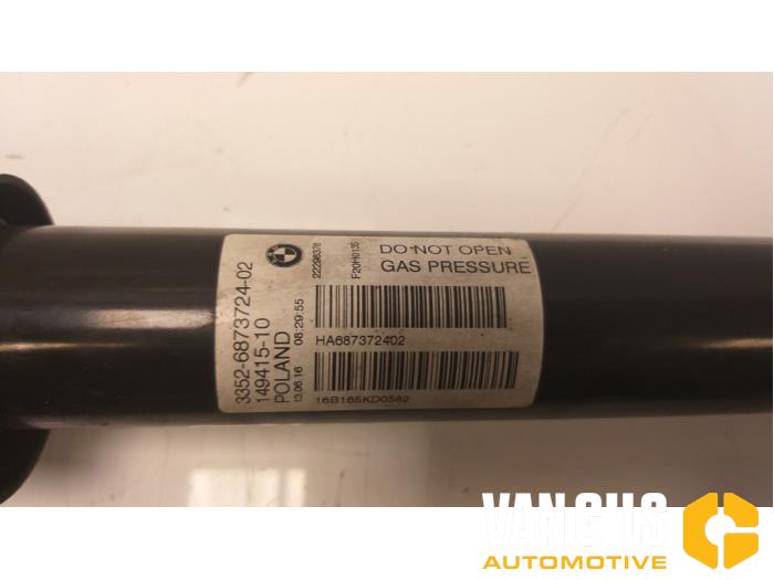 Shock absorber kit from a BMW 1 serie (F20) 118i 1.5 TwinPower 12V 2016