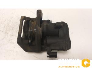 Used Rear brake calliper, left BMW 5-Serie Price on request offered by Van Gils Automotive