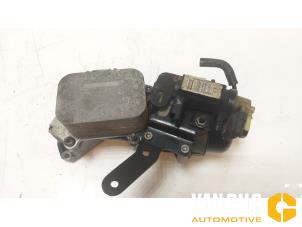 Used Oil cooler Ford Focus 3 Wagon 1.5 TDCi Price on request offered by Van Gils Automotive