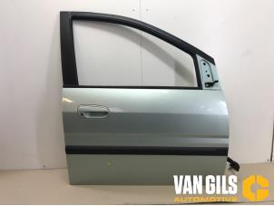 Używane Drzwi prawe przednie wersja 4-drzwiowa Hyundai Matrix 1.6 16V Cena € 150,00 Procedura marży oferowane przez Van Gils Automotive