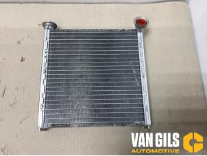 Used Heating radiator Volkswagen Touran (5T1) 1.4 TSI Price € 131,89 Inclusive VAT offered by Van Gils Automotive