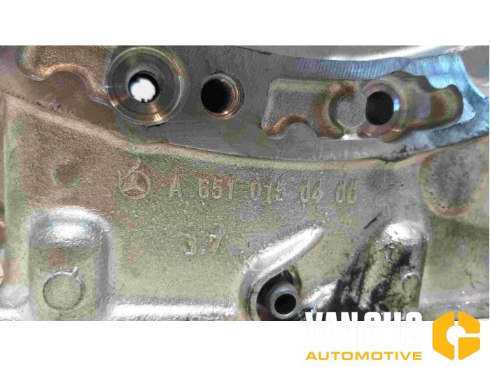 Timing cover from a Mercedes-Benz B (W246,242) 2.1 B-220 CDI BlueEFFICIENCY 16V