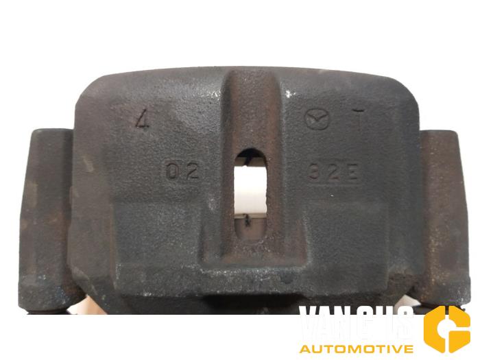 Front brake calliper, left from a Mazda CX-5 (KE,GH) 2.0 SkyActiv-G 16V 4WD 2013