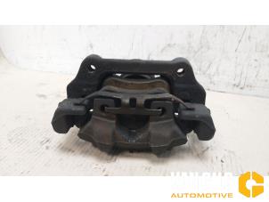 Used Front brake calliper, left BMW 3 serie Touring (F31) 320d 2.0 16V EfficientDynamicsEdition Price on request offered by Van Gils Automotive
