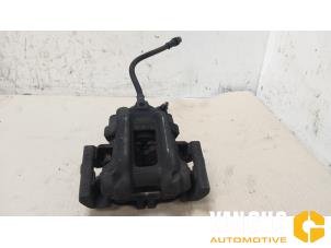Used Rear brake calliper, left BMW 3 serie Touring (F31) 320d 2.0 16V EfficientDynamicsEdition Price on request offered by Van Gils Automotive