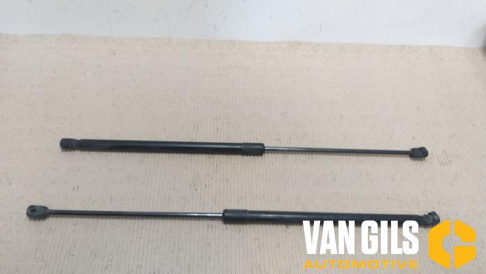 Set of tailgate gas struts from a Opel Corsa D 1.2 16V 2012