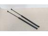 Set of tailgate gas struts from a Opel Corsa D 1.2 16V 2012