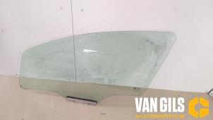 Used Door window 4-door, front left Opel Corsa D 1.2 16V Price on request offered by Van Gils Automotive
