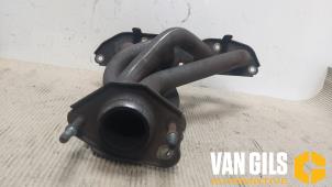 Used Exhaust manifold Mitsubishi Colt (Z2/Z3) 1.3 16V Price € 65,00 Margin scheme offered by Van Gils Automotive