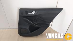 Used Rear door trim 4-door, right Ford Focus 4 1.0 Ti-VCT EcoBoost 12V 125 Price on request offered by Van Gils Automotive