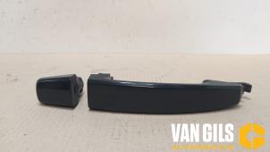 Used Door handle 2-door, right Opel Corsa D 1.2 16V LPG Price on request offered by Van Gils Automotive