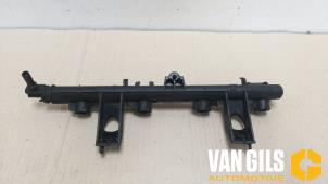 Used Fuel injector nozzle Renault Clio III (BR/CR) 1.2 16V 75 Price on request offered by Van Gils Automotive