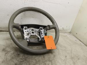 Used Steering wheel Mazda Demio (DW) 1.5 16V Price € 75,00 Margin scheme offered by Van Gils Automotive
